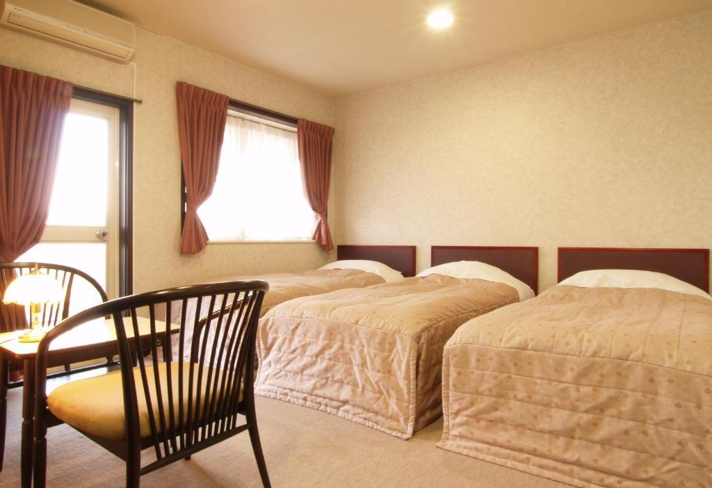 Akakura Yours Inn Myōkō Zimmer foto